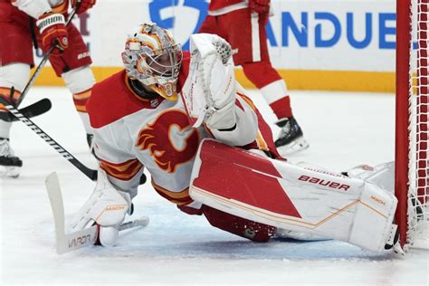 Alex DeBrincat notches hat trick as the Red Wings win fifth straight by downing Flames 6-2